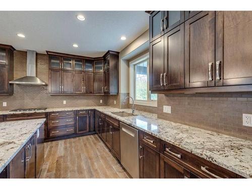 509 Hawk'S Nest Lane, Priddis Greens, AB - Indoor Photo Showing Kitchen With Upgraded Kitchen