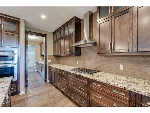 509 Hawk'S Nest Lane, Priddis Greens, AB - Indoor Photo Showing Kitchen With Upgraded Kitchen