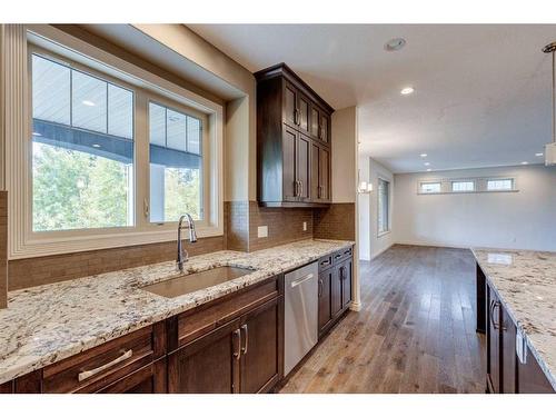 509 Hawk'S Nest Lane, Priddis Greens, AB - Indoor Photo Showing Kitchen With Upgraded Kitchen