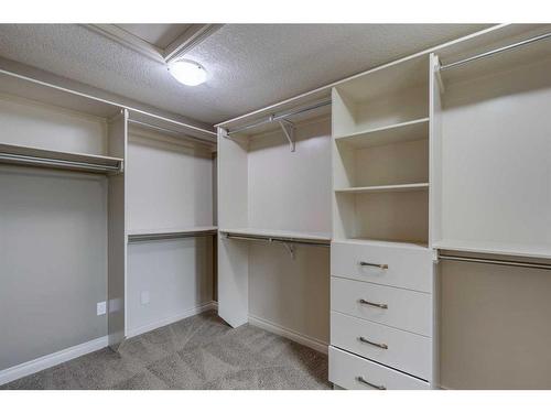 509 Hawk'S Nest Lane, Priddis Greens, AB - Indoor With Storage