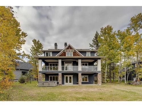 509 Hawk'S Nest Lane, Priddis Greens, AB - Outdoor With Deck Patio Veranda With Facade