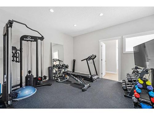 88 Cougar Ridge Landing Sw, Calgary, AB - Indoor Photo Showing Gym Room