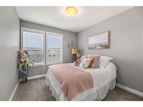 272 Midyard Lane Sw, Airdrie, AB - Indoor Photo Showing Bedroom