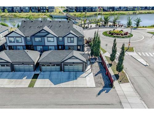 272 Midyard Lane Sw, Airdrie, AB - Outdoor With Body Of Water With Facade