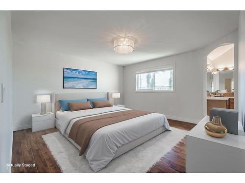 134 Coopers Bay Sw, Airdrie, AB - Indoor Photo Showing Bedroom