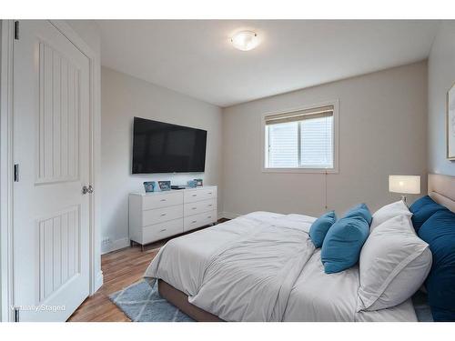 134 Coopers Bay Sw, Airdrie, AB - Indoor Photo Showing Bedroom