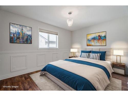 134 Coopers Bay Sw, Airdrie, AB - Indoor Photo Showing Bedroom