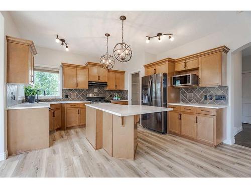 134 Coopers Bay Sw, Airdrie, AB - Indoor Photo Showing Kitchen With Stainless Steel Kitchen