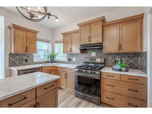 134 Coopers Bay Sw, Airdrie, AB - Indoor Photo Showing Kitchen