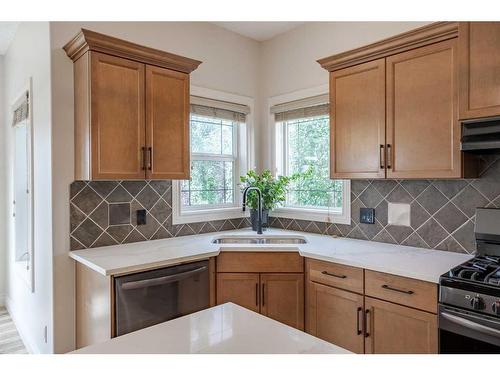 134 Coopers Bay Sw, Airdrie, AB - Indoor Photo Showing Kitchen With Double Sink