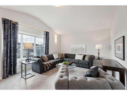 130 Reunion Landing Nw, Airdrie, AB - Indoor Photo Showing Living Room