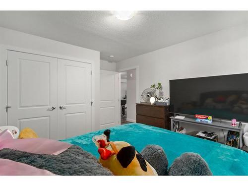 11-303 Waddy Lane, Strathmore, AB - Indoor Photo Showing Bedroom