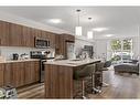 11-303 Waddy Lane, Strathmore, AB  - Indoor Photo Showing Kitchen With Stainless Steel Kitchen 