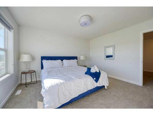 148 Magnolia Common Se, Calgary, AB - Indoor Photo Showing Bedroom