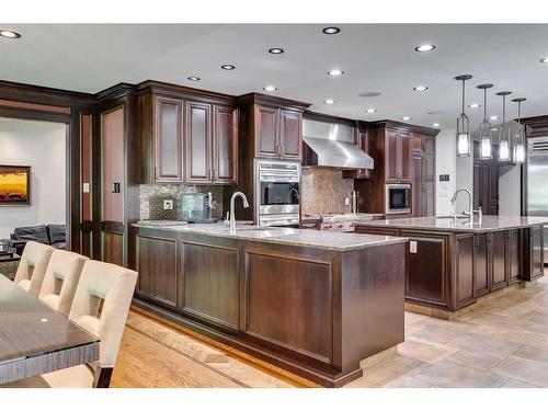 40 Eagle Ridge Place Sw, Calgary, AB - Indoor Photo Showing Kitchen With Upgraded Kitchen