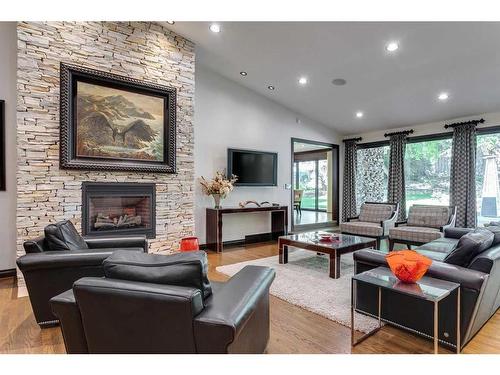 40 Eagle Ridge Place Sw, Calgary, AB - Indoor Photo Showing Living Room With Fireplace