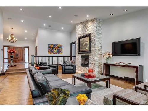 40 Eagle Ridge Place Sw, Calgary, AB - Indoor Photo Showing Living Room With Fireplace