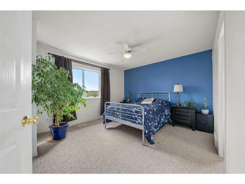 44 Crystalridge Close, Okotoks, AB - Indoor Photo Showing Bedroom