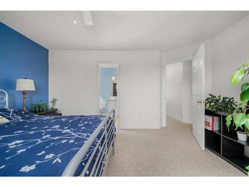 44 Crystalridge Close, Okotoks, AB - Indoor Photo Showing Bedroom