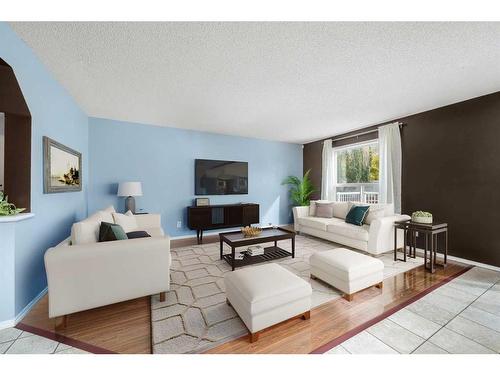 44 Crystalridge Close, Okotoks, AB - Indoor Photo Showing Living Room