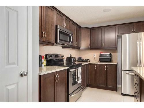 324 Windstone Gardens Sw, Airdrie, AB - Indoor Photo Showing Kitchen With Stainless Steel Kitchen