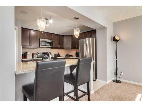 324 Windstone Gardens Sw, Airdrie, AB - Indoor Photo Showing Kitchen With Stainless Steel Kitchen