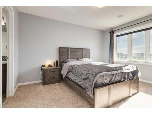 324 Windstone Gardens Sw, Airdrie, AB - Indoor Photo Showing Bedroom