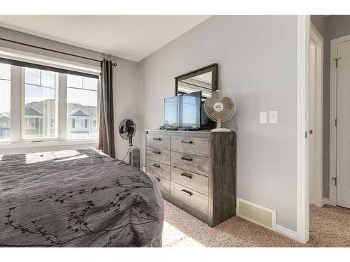 324 Windstone Gardens Sw, Airdrie, AB - Indoor Photo Showing Bedroom