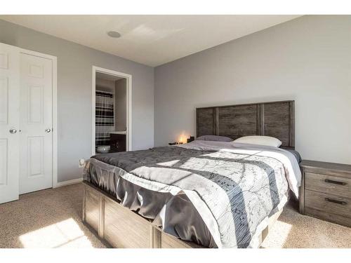 324 Windstone Gardens Sw, Airdrie, AB - Indoor Photo Showing Bedroom