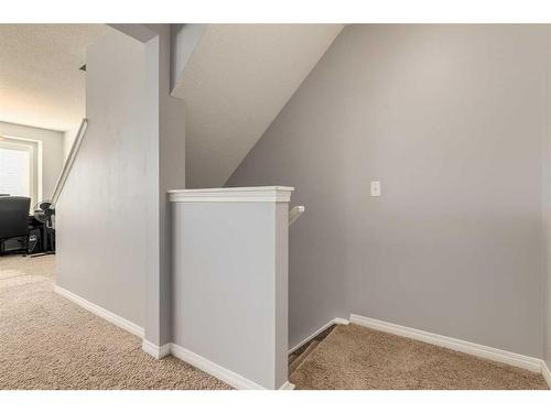 324 Windstone Gardens Sw, Airdrie, AB - Indoor Photo Showing Other Room