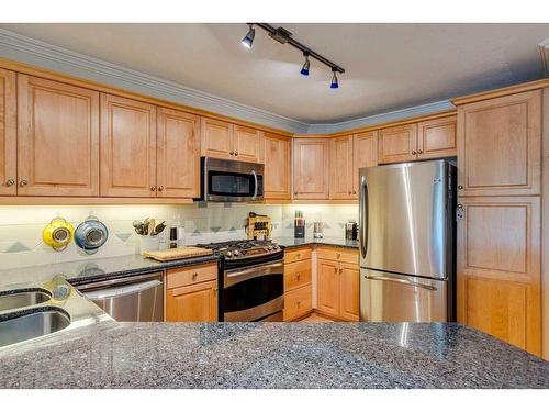 102-630 10 Street Nw, Calgary, AB - Indoor Photo Showing Kitchen