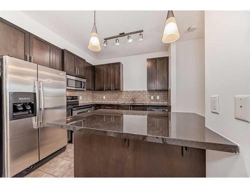 201-88 Arbour Lake Road Nw, Calgary, AB - Indoor Photo Showing Kitchen With Stainless Steel Kitchen With Upgraded Kitchen