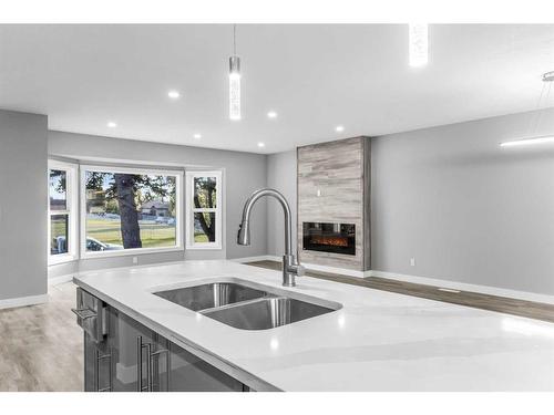 52 Templeby Drive Ne, Calgary, AB - Indoor Photo Showing Kitchen With Double Sink