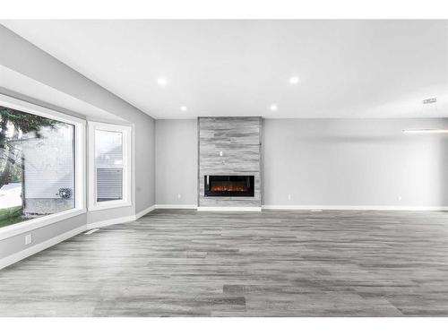 52 Templeby Drive Ne, Calgary, AB - Indoor With Fireplace