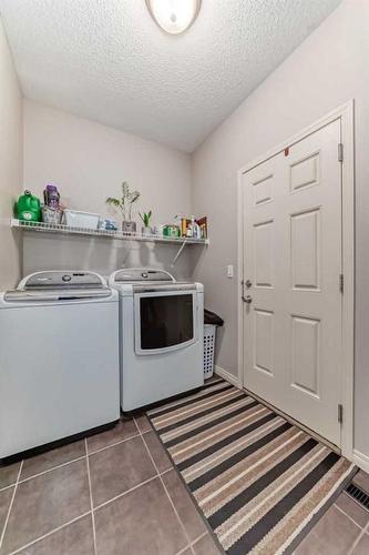 51 Cranberry Circle Se, Calgary, AB - Indoor Photo Showing Laundry Room