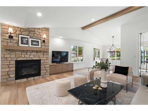 440 Wilverside Way Se, Calgary, AB - Indoor Photo Showing Living Room With Fireplace