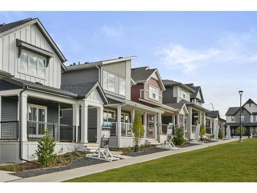 105 Marmot Walk Nw, Calgary, AB - Outdoor With Deck Patio Veranda With Facade