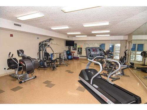 1305-151 Country Village Road Ne, Calgary, AB - Indoor Photo Showing Gym Room