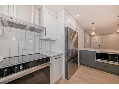 76 Lake Huron Place Se, Calgary, AB - Indoor Photo Showing Kitchen With Upgraded Kitchen