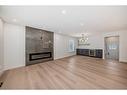 76 Lake Huron Place Se, Calgary, AB  - Indoor Photo Showing Living Room With Fireplace 