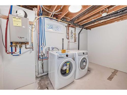 76 Lake Huron Place Se, Calgary, AB - Indoor Photo Showing Laundry Room