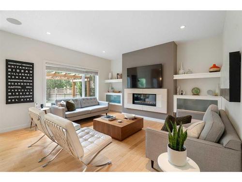 112 Wentworth Hill Sw, Calgary, AB - Indoor Photo Showing Living Room With Fireplace