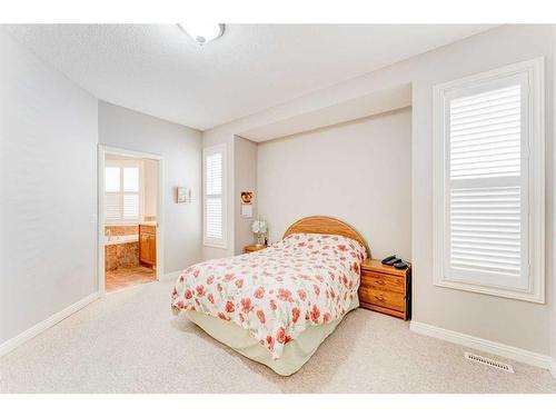 109 Panamount Road Nw, Calgary, AB - Indoor Photo Showing Bedroom