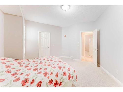 109 Panamount Road Nw, Calgary, AB - Indoor Photo Showing Bedroom