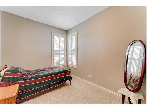 109 Panamount Road Nw, Calgary, AB - Indoor Photo Showing Bedroom