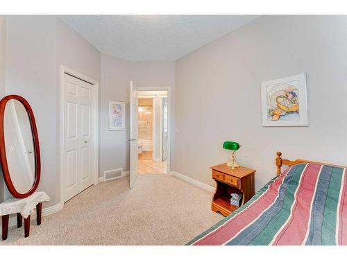 109 Panamount Road Nw, Calgary, AB - Indoor Photo Showing Bedroom