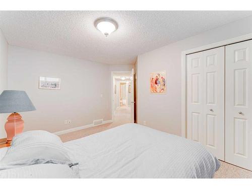 109 Panamount Road Nw, Calgary, AB - Indoor Photo Showing Bedroom