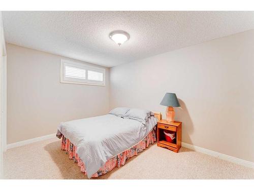 109 Panamount Road Nw, Calgary, AB - Indoor Photo Showing Bedroom