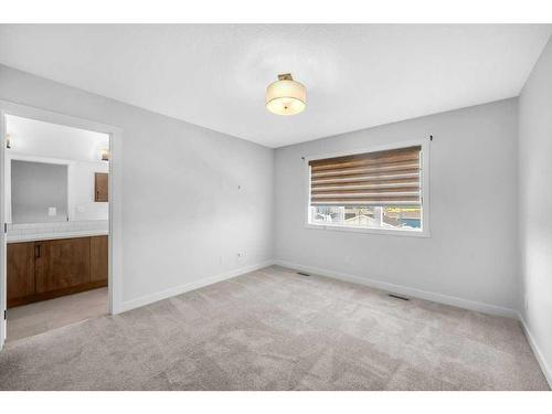 982 Bayview Rise Sw, Airdrie, AB - Indoor Photo Showing Other Room