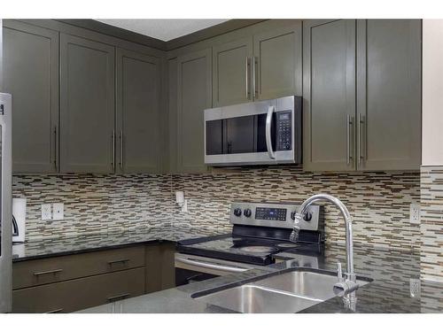 6111-155 Skyview Ranch Way Ne, Calgary, AB - Indoor Photo Showing Kitchen With Double Sink With Upgraded Kitchen